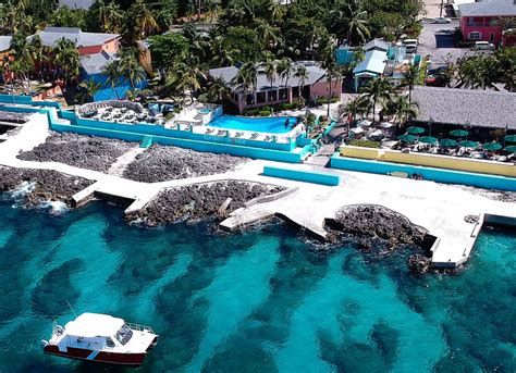 Sunset house grand cayman - We have found the beginning of why so many people love Sunset House, Grand Cayman's Hotel for Divers, by Divers. This family owned resort is more of a big guest house, than a hote